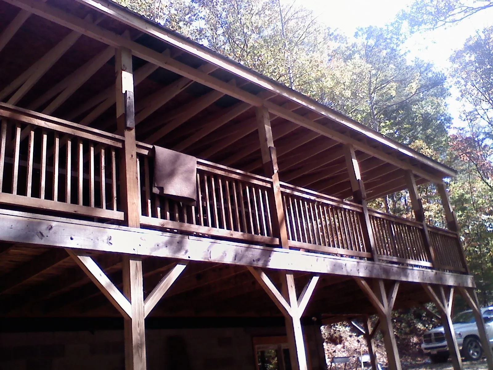 Timber framing under a new elevated porch and deck — Roof Leak Repair in Idabel by Roofing Brothers